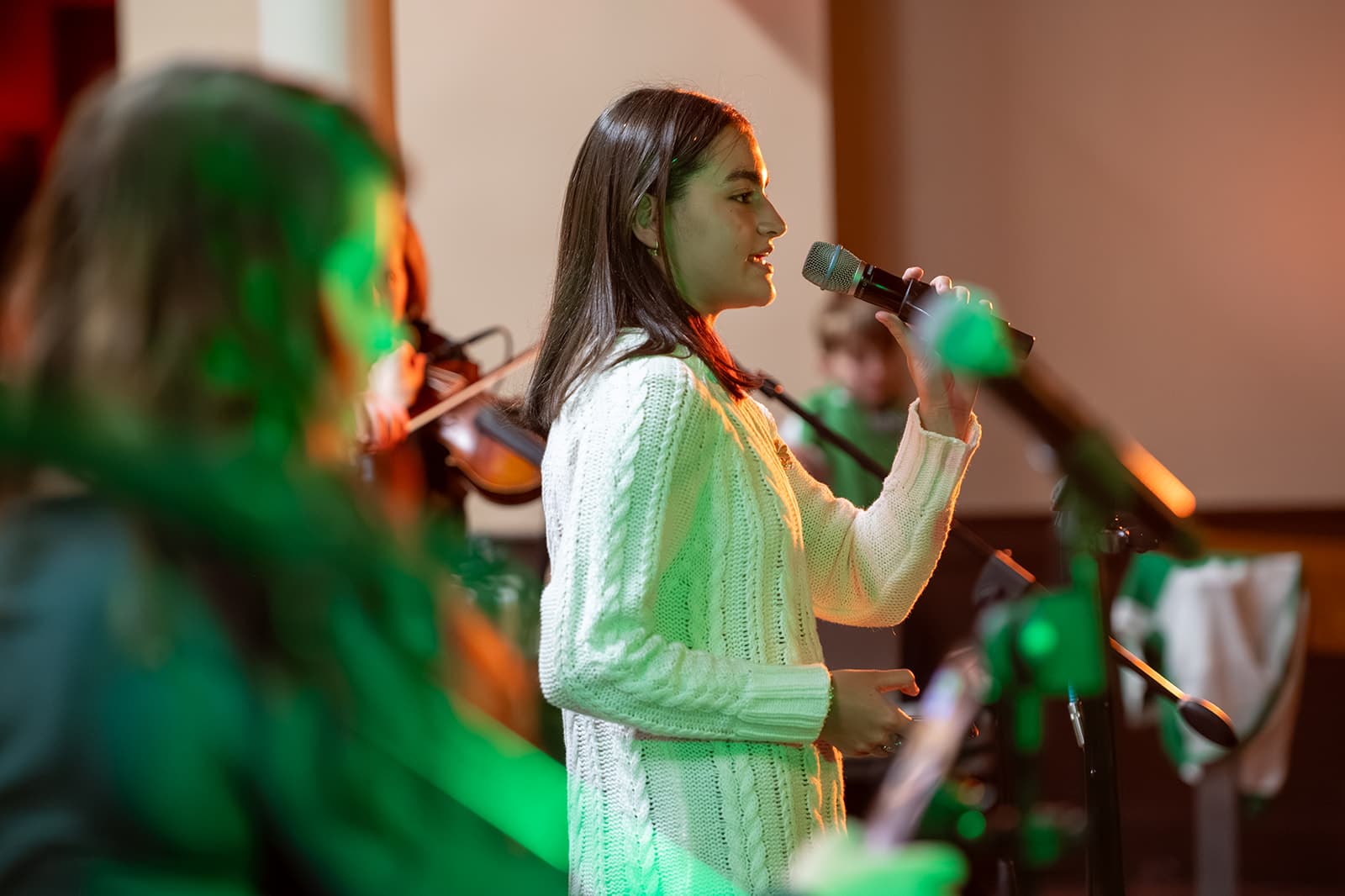 Close-up of a drummer performing during the Guild's 2026 St. Patrick's Day gathering.