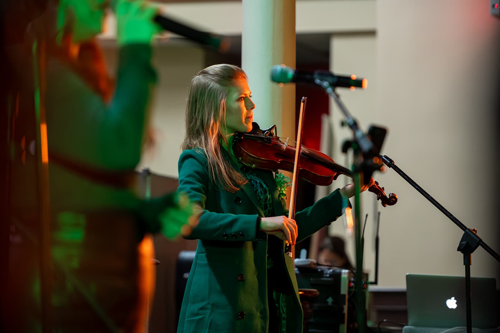 Violinist performing during the Guild's 2026 St. Patrick's Day gathering.